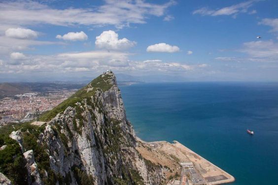 The Rock of Gibraltar is a high cliff at the south-western edge of the Mediterranean Sea, a natural defense to hold it from attackers. At the top is O’Hara’s Battery, an artillery fortification built in 1890. The Gibraltar Cable Car, a tourist attraction in its own right, offers pleasant transportation to the top of the Rock.