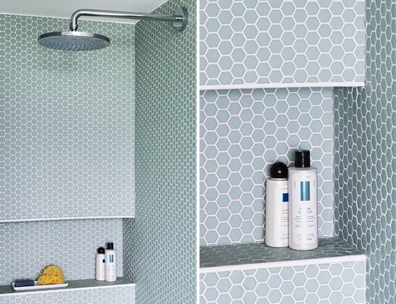 A Recessed Shelf Lined With Penny Tiles Adds A Pop Of Color To This Bathroom