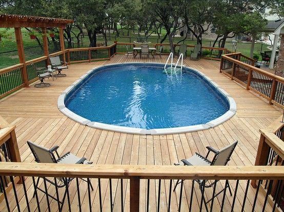 Above Ground Pools With Decks 20 Awesome Photo An Essential Guide For Those Looking At Installing An Above Best Above Ground Pool Backyard Pool Oval Pool