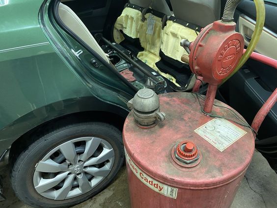 Draining diesel out of a Toyota Corolla
