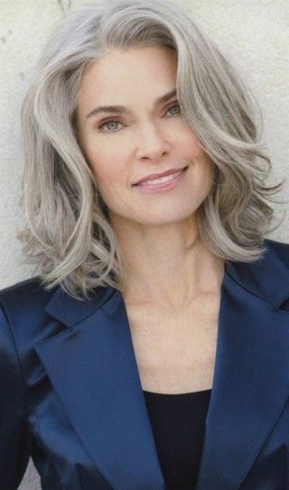 Hairstyles For Women Over 50 - Platinum Bob With Wavy Bangs #FashionTrendsForWomenOver50