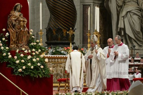 Pope Francis leads a mass on Christmas eve marking the birth of Jesus Christ, at St Peter's basilica in The Vatican, on December 24, 2015