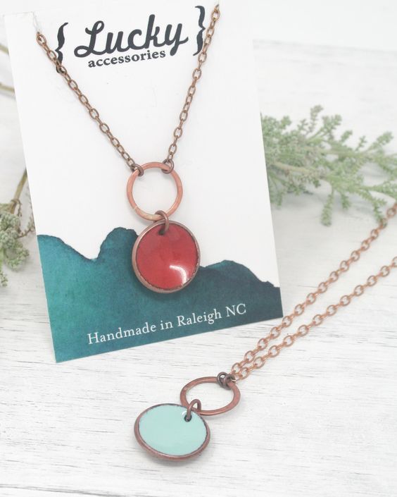 Necklace with enameled penny suspended on ring, on chain. The chain length is adjustable from 16 to 18"Pendant measures1.25"Penny jewelry is a great copper anniversary gift.Many buy my enamel penny jewelry as a "pennies from heaven" gift, to remember a loved one.You can order these with a custom date (between 1940 and 1982) buy adding this custom date upgrade here