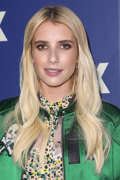 Emma Roberts Wavy Platinum Blonde Angled, Dark Roots Hairstyle | Steal Her Style