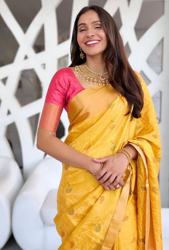 Andrea Jeremiah chooses a yellow silk saree for a shop opening!