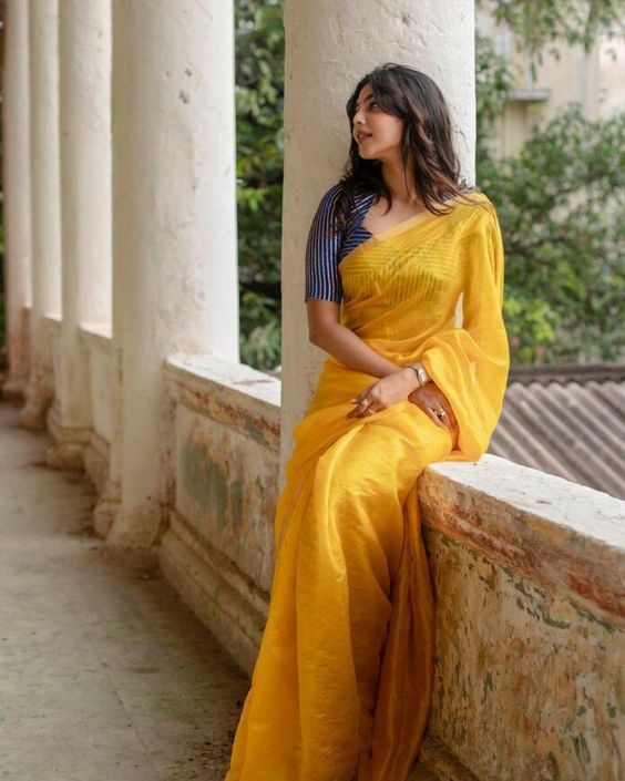 Aishwarya Lekshmi in yellow raw mango saree for new movie muhurat 1