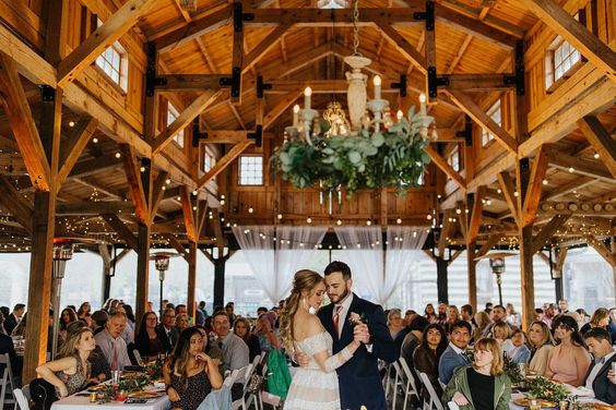 Jordan and Jessie tied the knot with an outdoor ceremony held at the Chapel Hill Carriage House. This whimsical wedding day was filled with eclectic details and homespun touches that were perfectly set up to complement the rustic backdrop of the venue. From alpacas and hand picked flowers to sweet treats and a historical farm — every inch of this wedding was so thoughtfully planned. Visit rusticweddingchic.com for more wedding inspiration | Photo: @michelleelysephoto