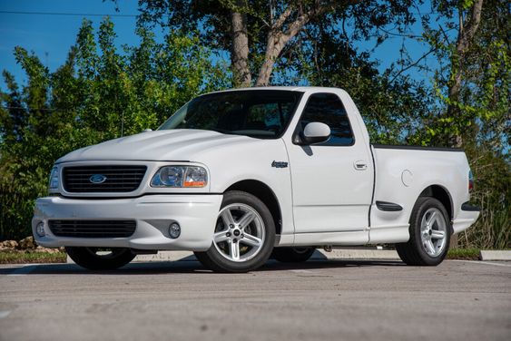 For Sale: 2003 Ford F-150 SVT Lightning (modified, Oxford White, supercharged 5.4L V8, 4-speed auto, 16K miles)