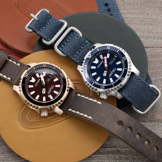 right - Citizen Promaster Marine Mechanical Divers Watch 200m Limited Edition NY0083-14X Rose Gold left - Citizen Promaster Marine Mechanical Divers Watch 200m Limited Edition NY0081-10L Blue Dial