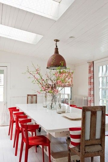 Patriotic decor ideas: brigh red dining chairs in a white dining room. #redandwhite #patriotic #decor