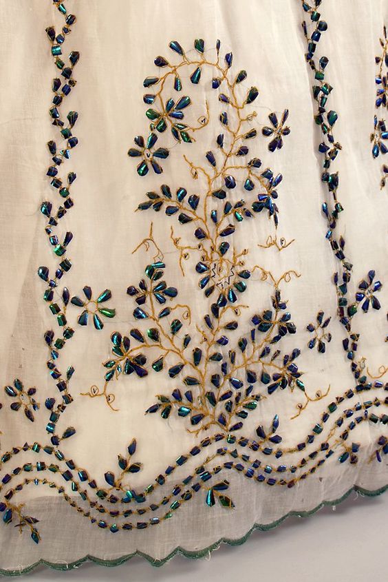 White cotton gauze dress embroidered with beetle wings, embroidered in India for export, ca 1865, KSUM 1983.1.98.