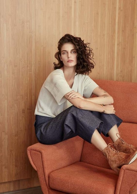 An off-white top is paired with cropped chambray pants and suede boots for Veda Pre-Fall 2016