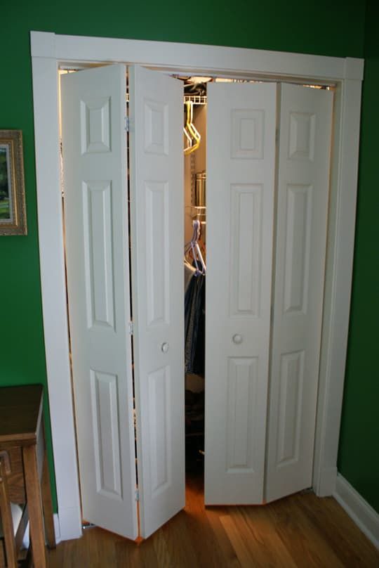 Interior Minimalist Apartment Interior In Ostozhenka Street Wood Wardrobe With Folded Cover With Images Modern Closet Doors Bifold Closet Doors Bedroom Closet Doors