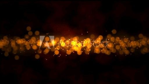 Abstract golden particles background with small bokeh. Glamour sparkly holiday and wedding background.