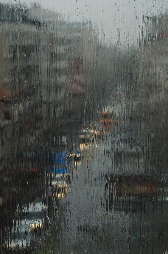 "Rainy ,gloomy Day Trough The Wet Window" by Stocksy Contributor "Marija Anicic"