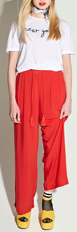 White t-shirt, red palazzo pants, yellow flatforms, varsity fishnet socks. #spring #trends #springoutfits #spring2018 #primark