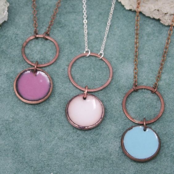 Necklace with enameled penny suspended on copper ring, on chain. The chain length is adjustable from 16 to 18"Pendant measures1.5"Penny jewelry is a great teacher gift.Many buy my enamel penny jewelry as a "pennies from heaven" gift, to remember a loved one.You can order these with a custom date (between 1940 and 1982) buy adding this custom date upgrade here