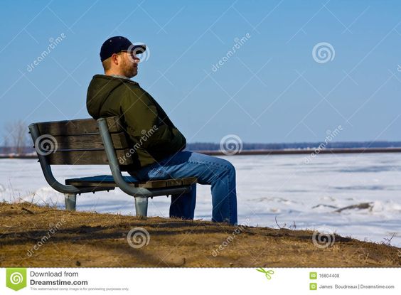 Sad man on a bench. A sad lonely depressed man sits alone on a bench on a sunny #Sponsored , #advertisement, #advertisement, #man, #sad, #sits, #bench