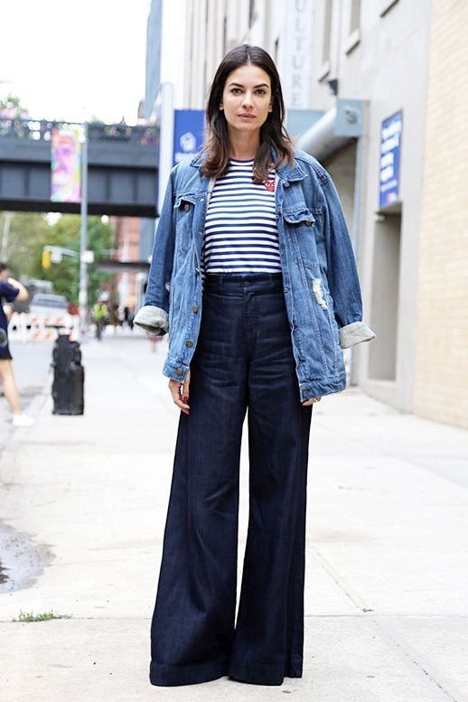 Photos via: @filleilamignon | The Thread Street style star Leila Yavari perfects a casual cool way to wear wide-leg denim for fall. Get the look: + Comme Des Garcons PLAY Stripe Red Heart Tee + Curren