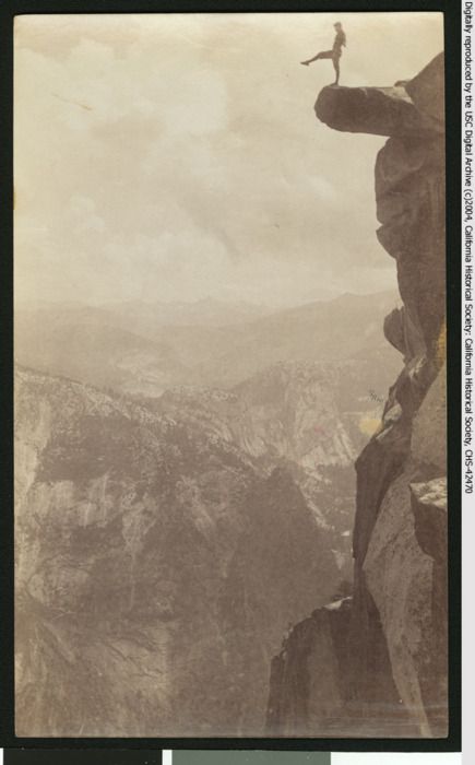 A man poses atop Overhanging Rock at Yosemite National Parkâs Glacier Point, circa 1920s.