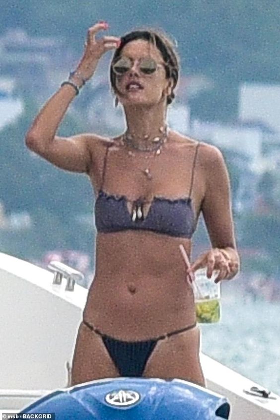 Alessandra Ambrosio shows off her toned figure in a dusty blue string bikini | Daily Mail Online
