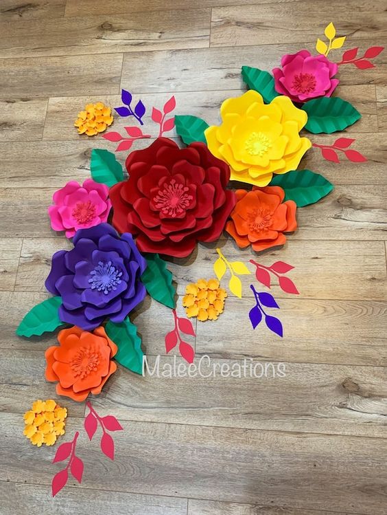 Beautiful set of 10 paper flowers. Perfect addition to fiesta themed party or Hawaiian themed party. This set includes 1- 15 inches flower 2- 12 inches flowers 4- 9 inches flowers 3- 5 inches flowers And leaves. Flowers come fully assembled and ready to use. COLORS CAN BE CUSTOMIZE. Feel free to