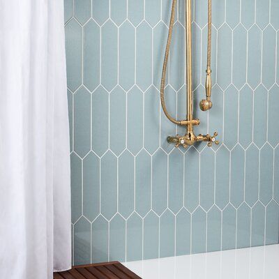 The Saloni collection offers a classy new take on Elongated Hexagons. Run them vertically or horizontally for unlimited design options. Saloni is offered in 3 colorways, each sporting a unique crackled ceramic design and is sure to add life to any wall application. Color: Blue | Ivy Hill Tile Saloni 3" x 12" Ceramic Subway Tile Ceramic in Blue, Size 11.81 H x 2.85 W x 0.33 D in | Wayfair