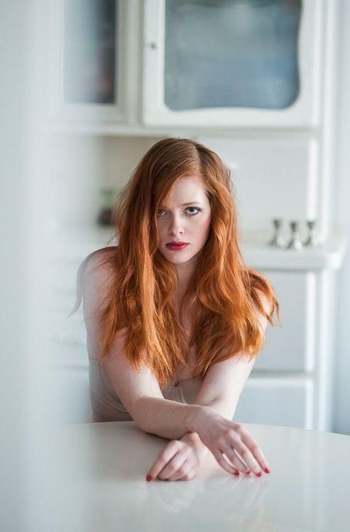 Bending otngagged redhead woman