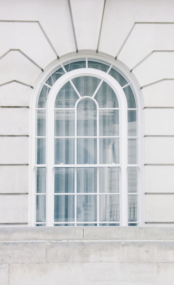 White arched window. Download this photo by Imani Clovis on Unsplash