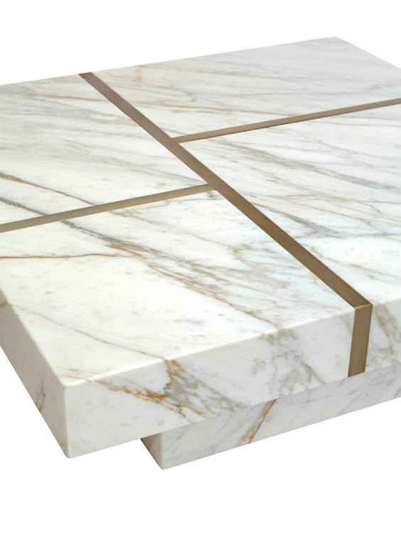 Handmade coffee table designed by Two Is Company. Marble with oxidized brass linear pattern, model