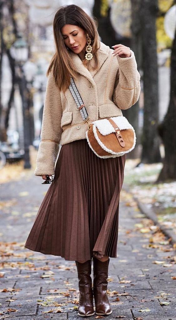 what to wear with a nude fur jacket : crossbody bag   brown midi skirt   boots