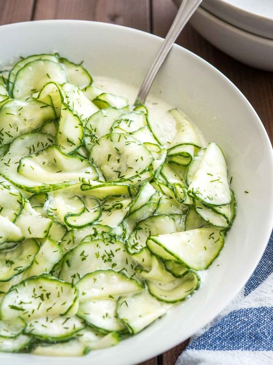 German Cucumber Salad is a refreshing summer salad made with simple ingredients that are a staple in most kitchens! This easy recipe is easy to make, budget-friendly, and perfect for a potluck, family dinner, or summer cookout.
