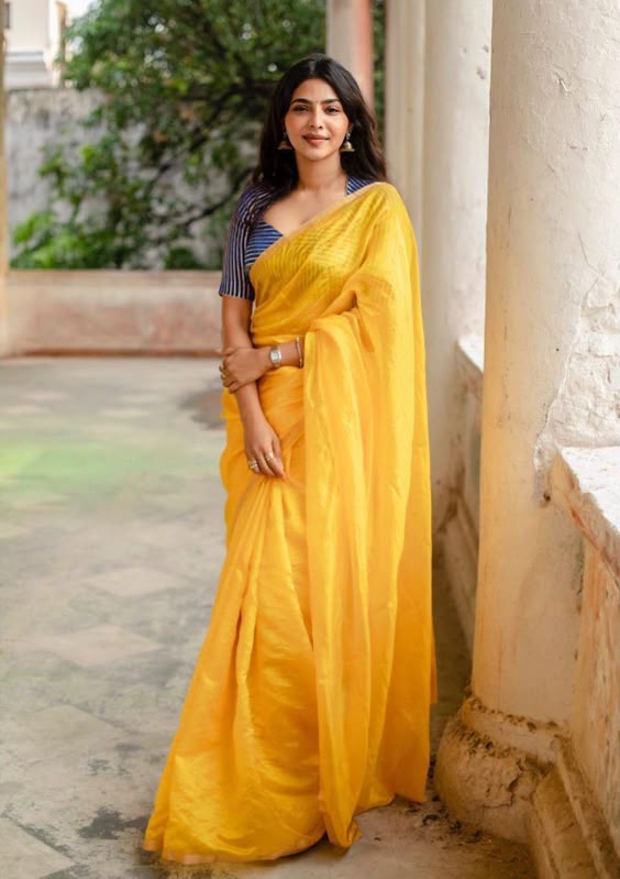 Aishwarya Lekshmi shines in a yellow saree at her new movie\'s muhurat ceremony!