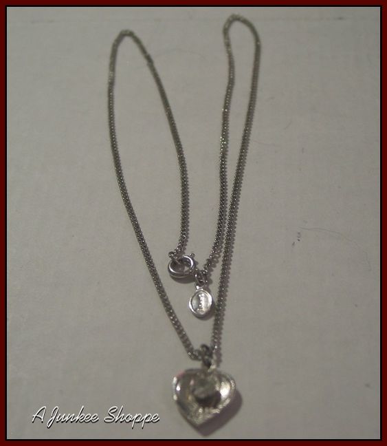 Theda Sterling Silver Pendant With Rhinestone And Avon Chain Jewelry Theda Sterling Silver Pendant With Rhinestone And Avon Chain Jewelry http://ajunkeeshoppe.blogspot.com/