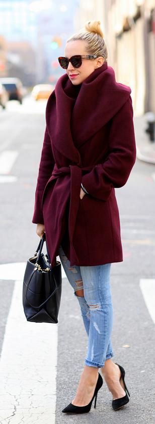 That plum toned coat will warm you right up. I love how this style doesn't hide her shape and still gives definition in the right places
