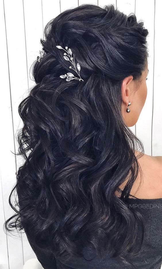 Half up and half down curly hairstyle