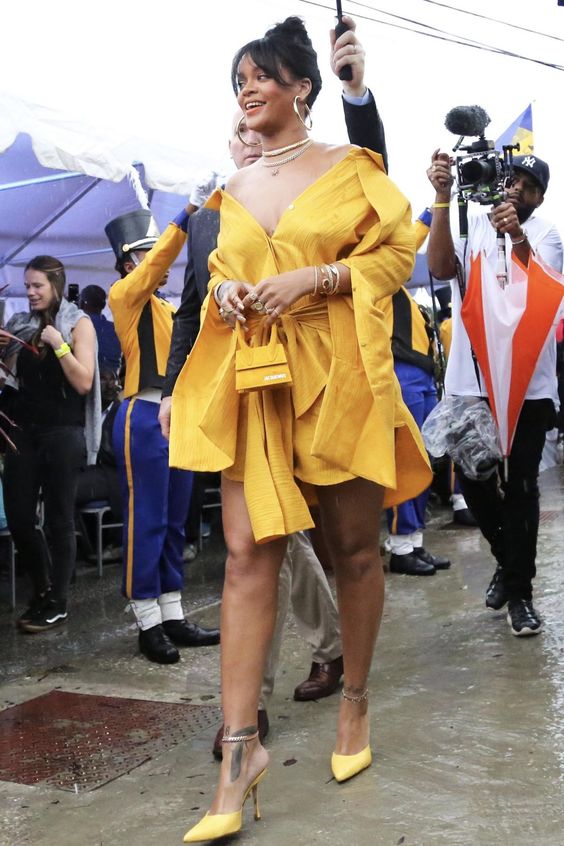 Rihanna wearing Jacquemus Le Sac Chiquito Bag, Hellessy Hutton Wrap Waist Shirt Dress, Jennifer Fisher Samira Hoop Earrings, Turner & Tatler Pearl and Diamond Starburst Necklace and Marina B. Necklace