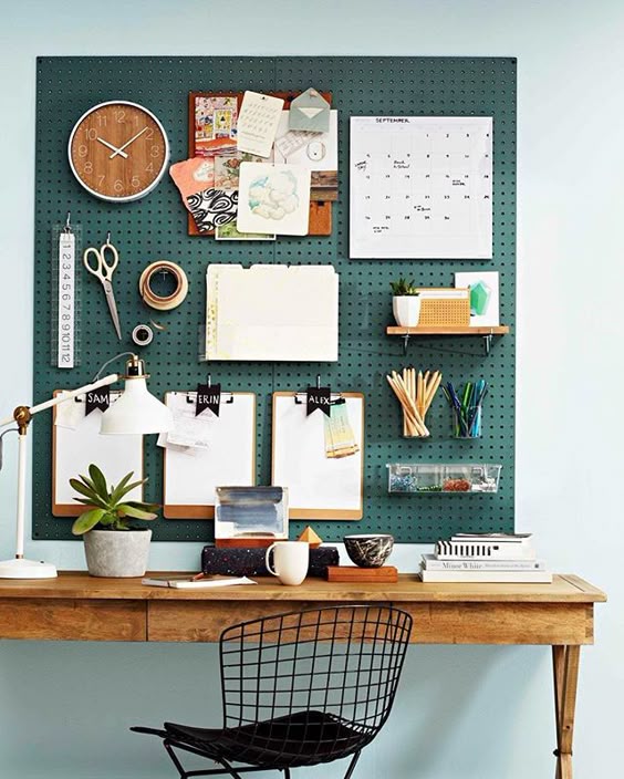 Get hooked on this over-the-desk pegboard organiser! All you need is a sheet of masonite pegboard, various hooks, a table, chair and desk lamp and you're in business — the home office kind! Style up your pegboard organiser with colour (if you like this shade, try Dulux Inner Space) and accessories such as acrylic or wire baskets, mini shelves and pen holders. For more great pegboard and storage ideas, check out the February issue of Better Homes and Gardens magazine. Dora, deputy and decorat...