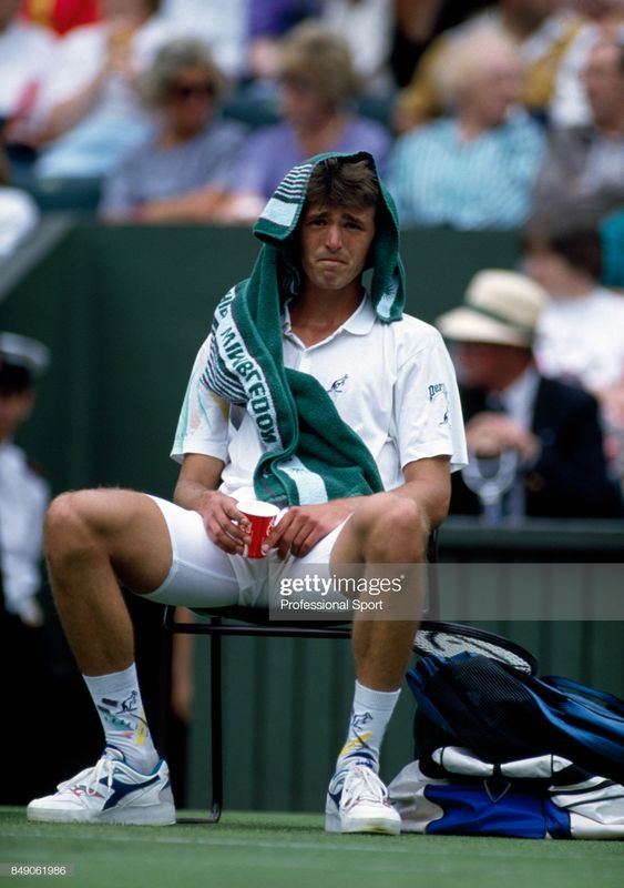 News Photo : Goran Ivanisevic of Croatia takes a break during...