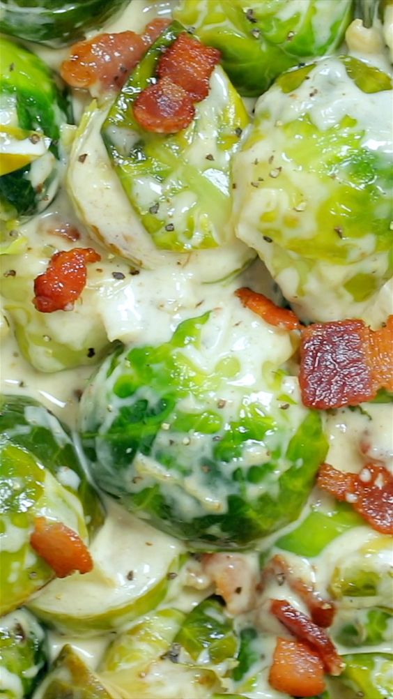 Brussels Sprouts Recipe in a creamy parmesan garlic alfredo sauce topped with crisp bacon. Quick and easy, holiday-worthy Alfredo Brussel Sprouts that comes together in one-pan! #sidedish #howtocookbrusselsprouts #easyrecipes #sides #holidaysidedish and stay at home Brussels Sprouts Recipe in a creamy parmesan garlic alfredo sauce topped with crisp bacon. Quick and easy, holiday-worthy Alfredo Brussel Sprouts that comes together in one-pan! #sidedish #howtocookbrusselsprouts #easyrecipes #sides #holidaysidedish and stay at home