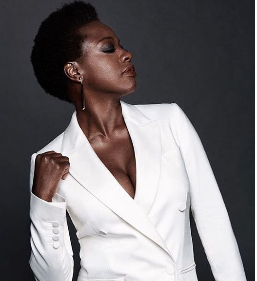 "I hear a knock at the door a minute later and Detective Wood walks in, her heels clicking on the floor. Sheâs wearing a white power suit that clashes beautifully against her dark skin."