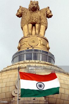 News Photo : The Indian national flag flies in front of the...