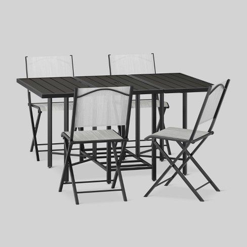The Gateleg Patio Table And Stowable Chairs Hammacher Schlemmer Outdoor Folding Table Outdoor Tables And Chairs Patio Table