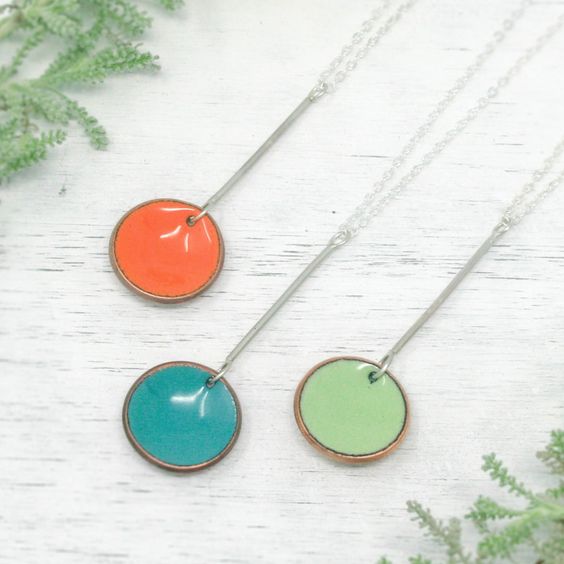 Necklace with enameled penny suspended from sterling silver design.The chain length is adjustable from 16 to 18"Pendant measures 2"Ready to ship.Penny jewelry is a great copper anniversary gift.Many buy my enamel penny jewelry as a "pennies from heaven" gift, to remember a loved one.You can order these with a custom date (between 1940 and 1982) buy adding this custom date upgrade here
