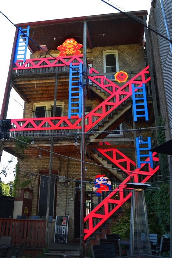 A new installation at Replay Arcade Bar\'s Boystown location is bringing the nostalgic imagery of retro video games off the screen and into the real world. Step