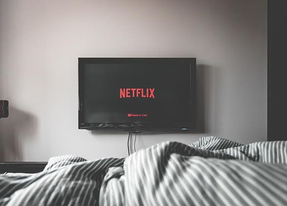 Watching Netflix on TV in bed