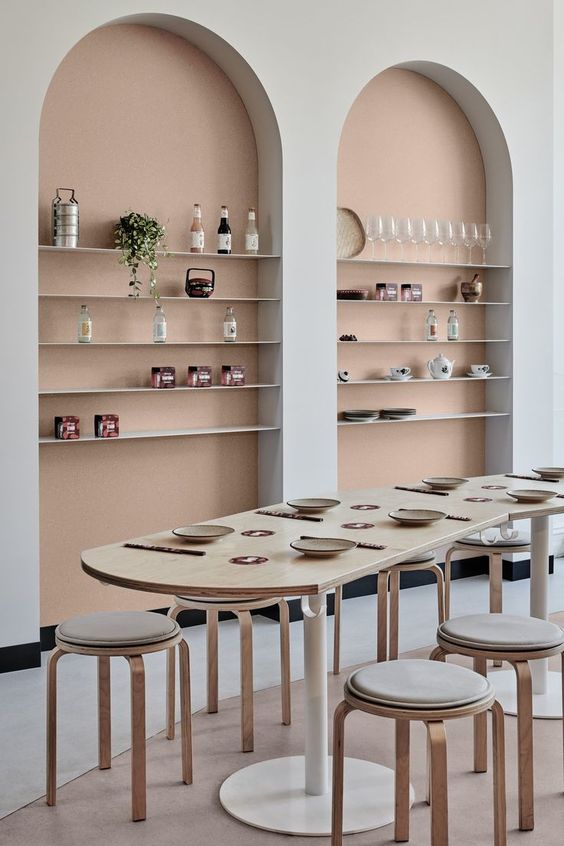 The arches, the table ends and feet, the stools... curves are everywhere in this #restaurantinterior