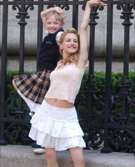 Dakota Fanning on Instagram: “#fbf Brittany Murphy was a ray of sunshine that made every day of filming magical for me. #uptowngirls ☀️”