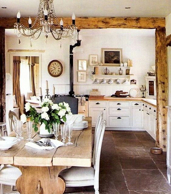 Rustic white kitchen with rugged wood beams and farm table. 40 Beautiful European Country Kitchens. #european #country #kitchen #rustic