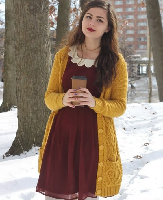 This cardigan is everything. Length is great, it's nice and chunky, long sleeves, pockets. I want it! The dress is nice too, Peter pan collar and the color is great. -Jessy W.